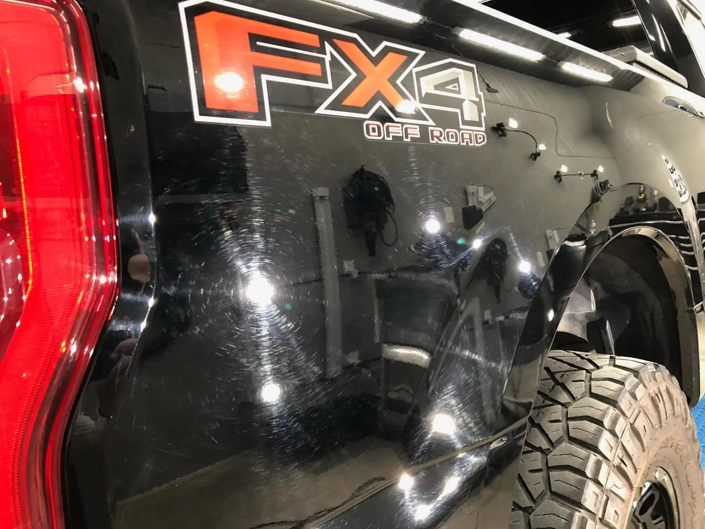 Black Ford F-250 Super Duty before paint correction