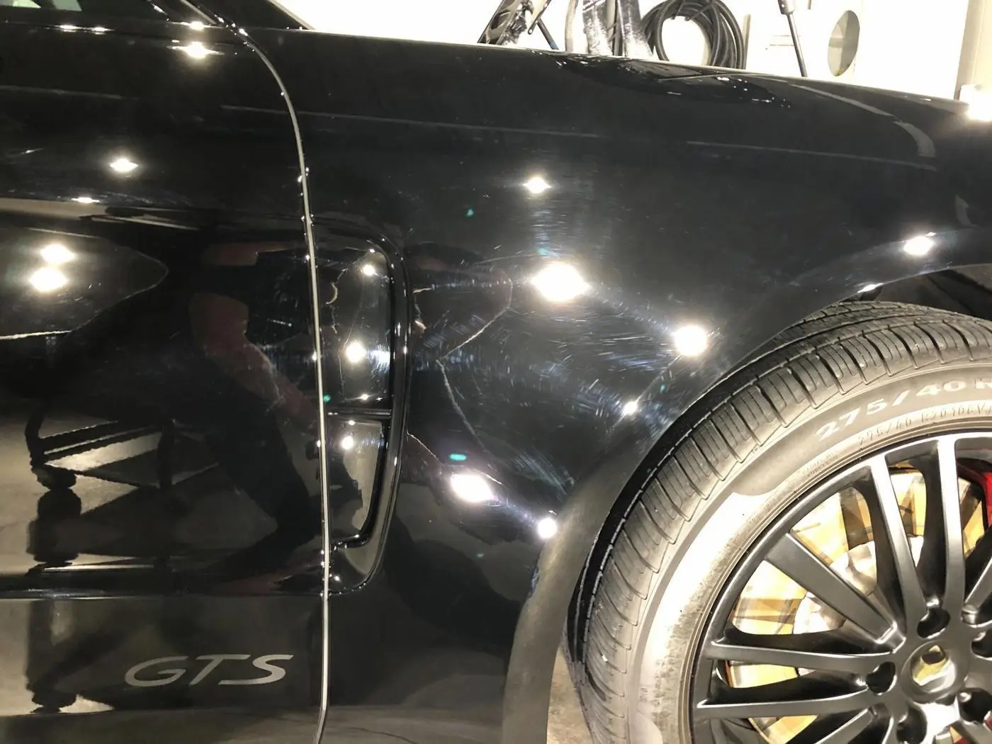 Black Porsche Panamera before paint correction