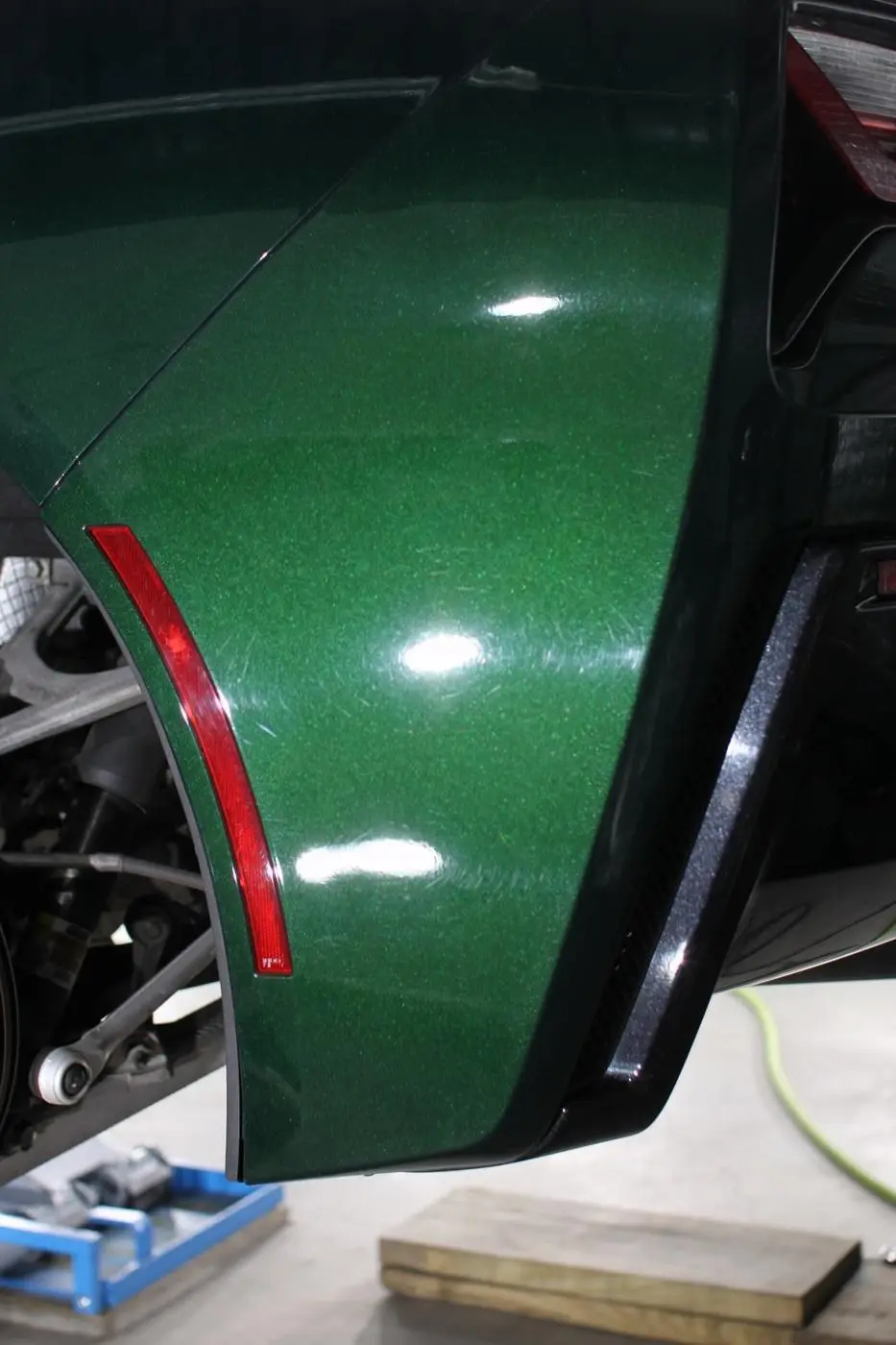 Green Corvette C7 before paint correction