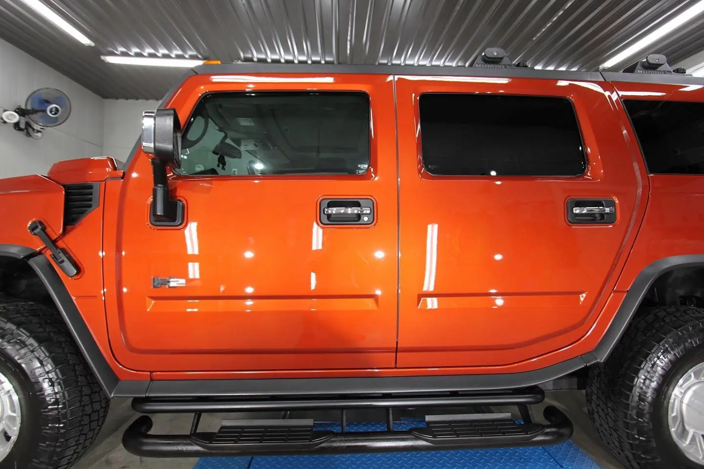 Orange Hummer detailed by Derrick's Details in Austin, photo 2 of 9