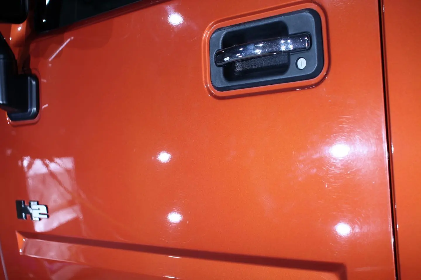 Orange Hummer before paint correction