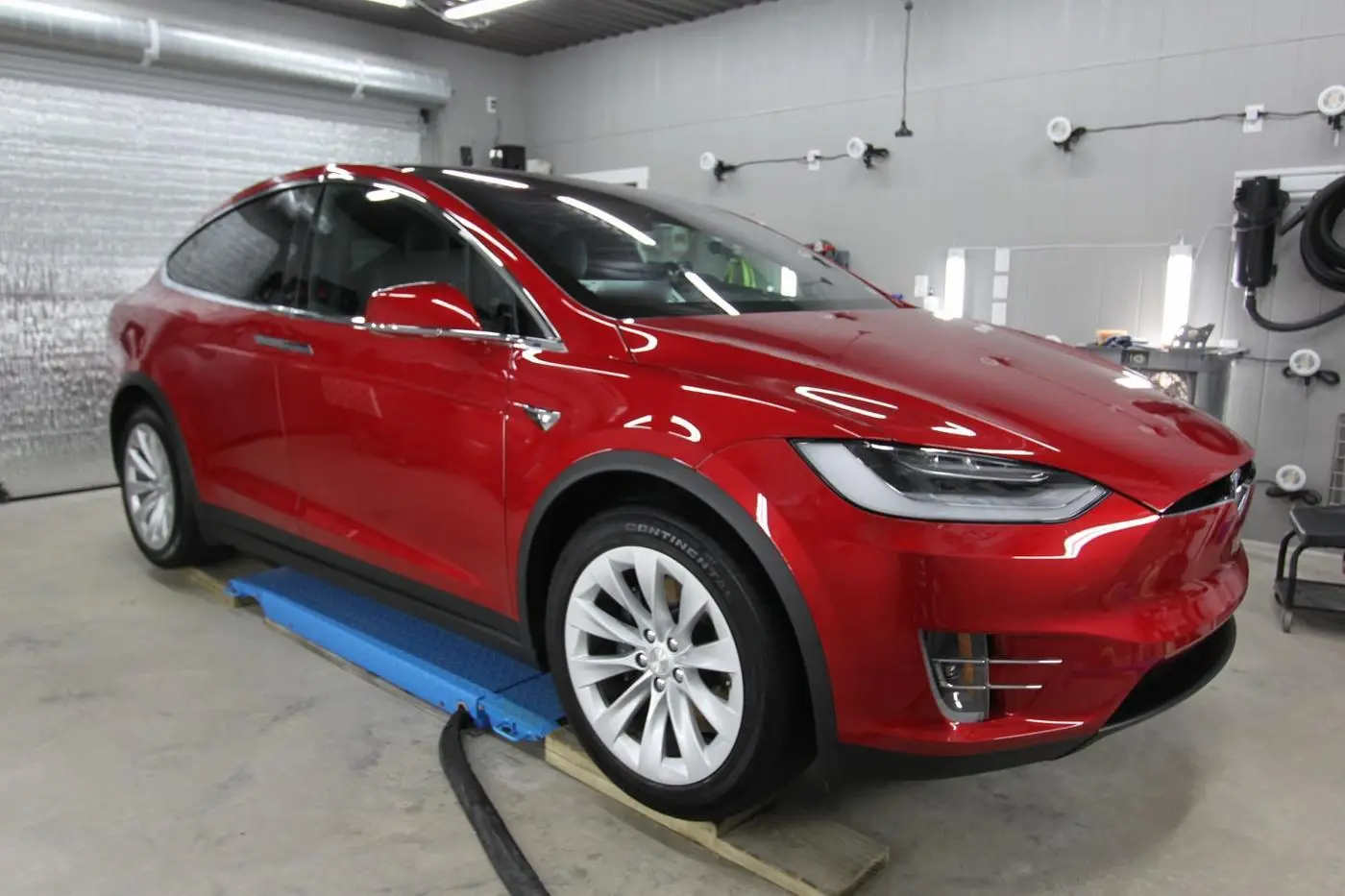 Red Tesla Model S detailed by Derrick's Details in Austin, photo 1 of 9