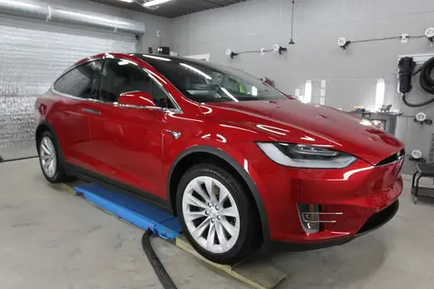 Red Tesla Model S detailed by Derrick's Details
