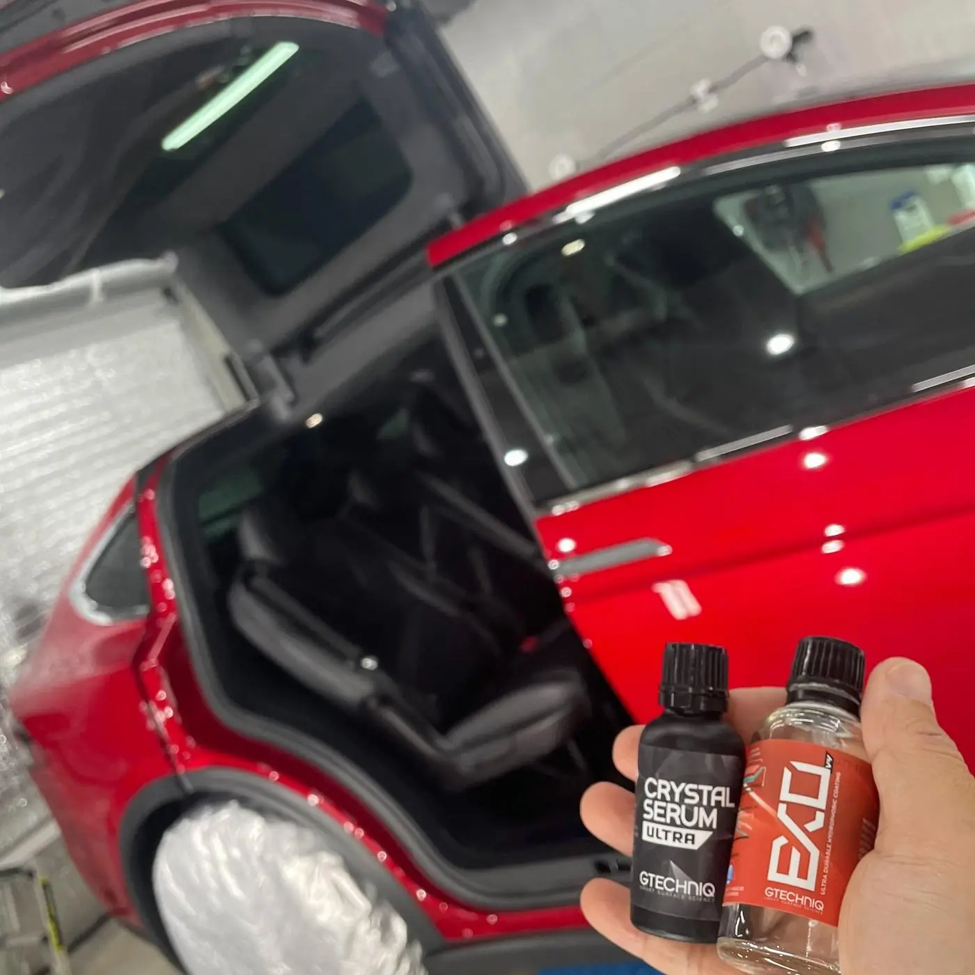 Red Tesla Model S detailed by Derrick's Details in Austin, photo 4 of 9