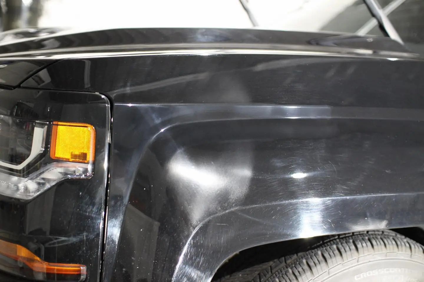 Black Chevrolet Silverado before paint correction