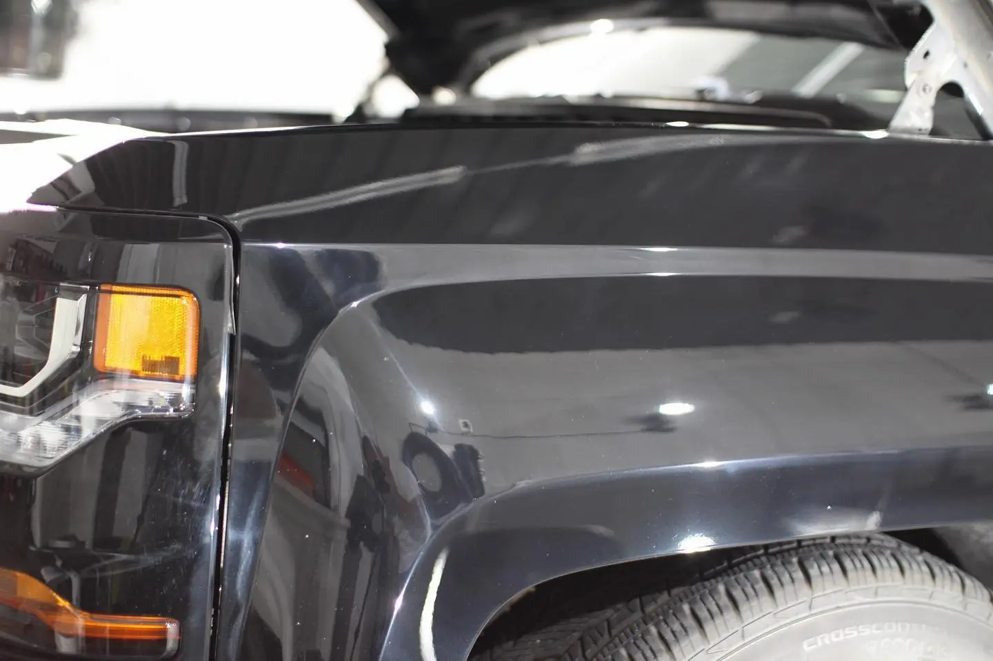 Black Chevrolet Silverado after paint correction