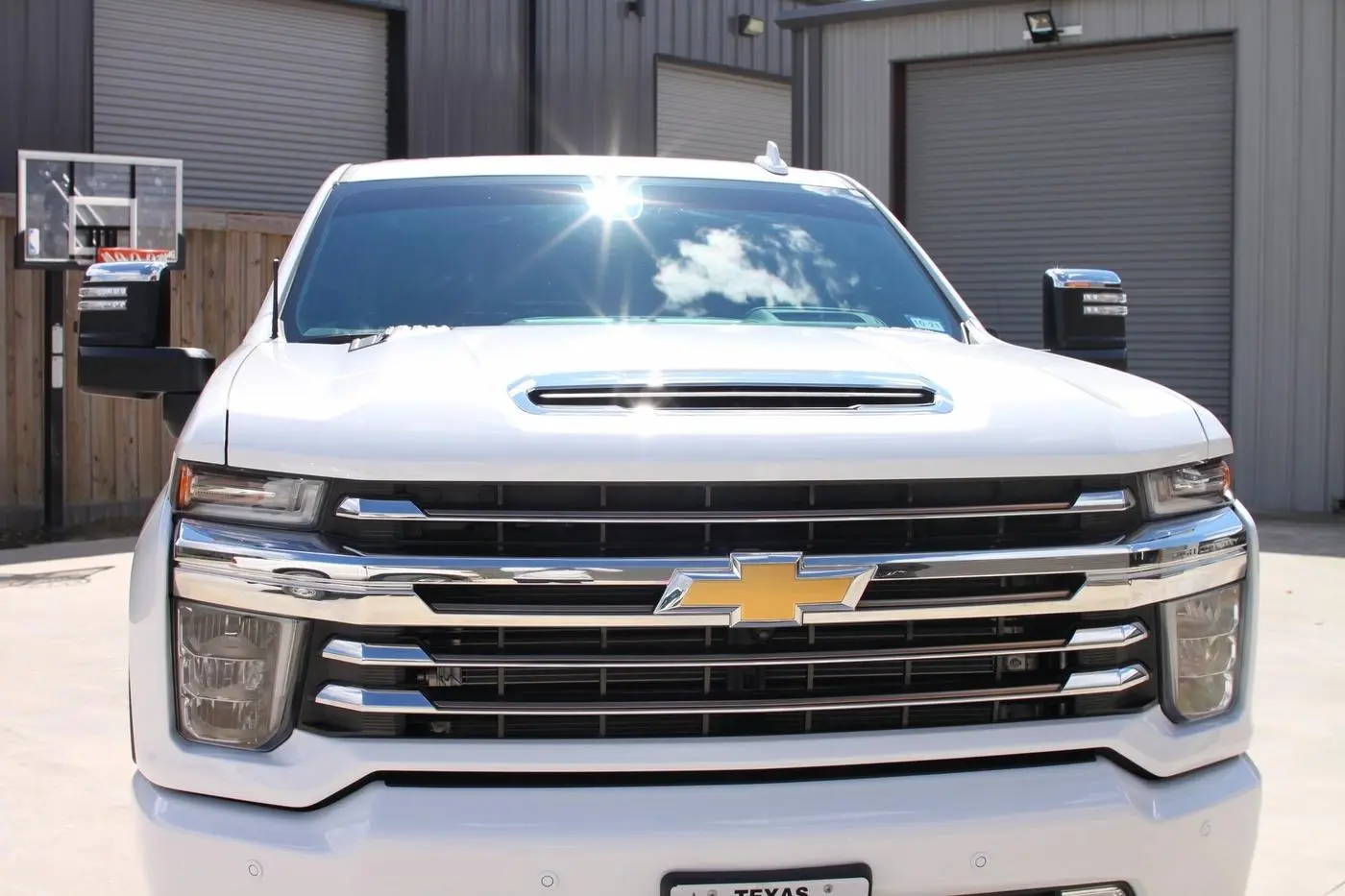 White Chevrolet Silverado 2500HD detailed by Derrick's Details in Austin, photo 3 of 17