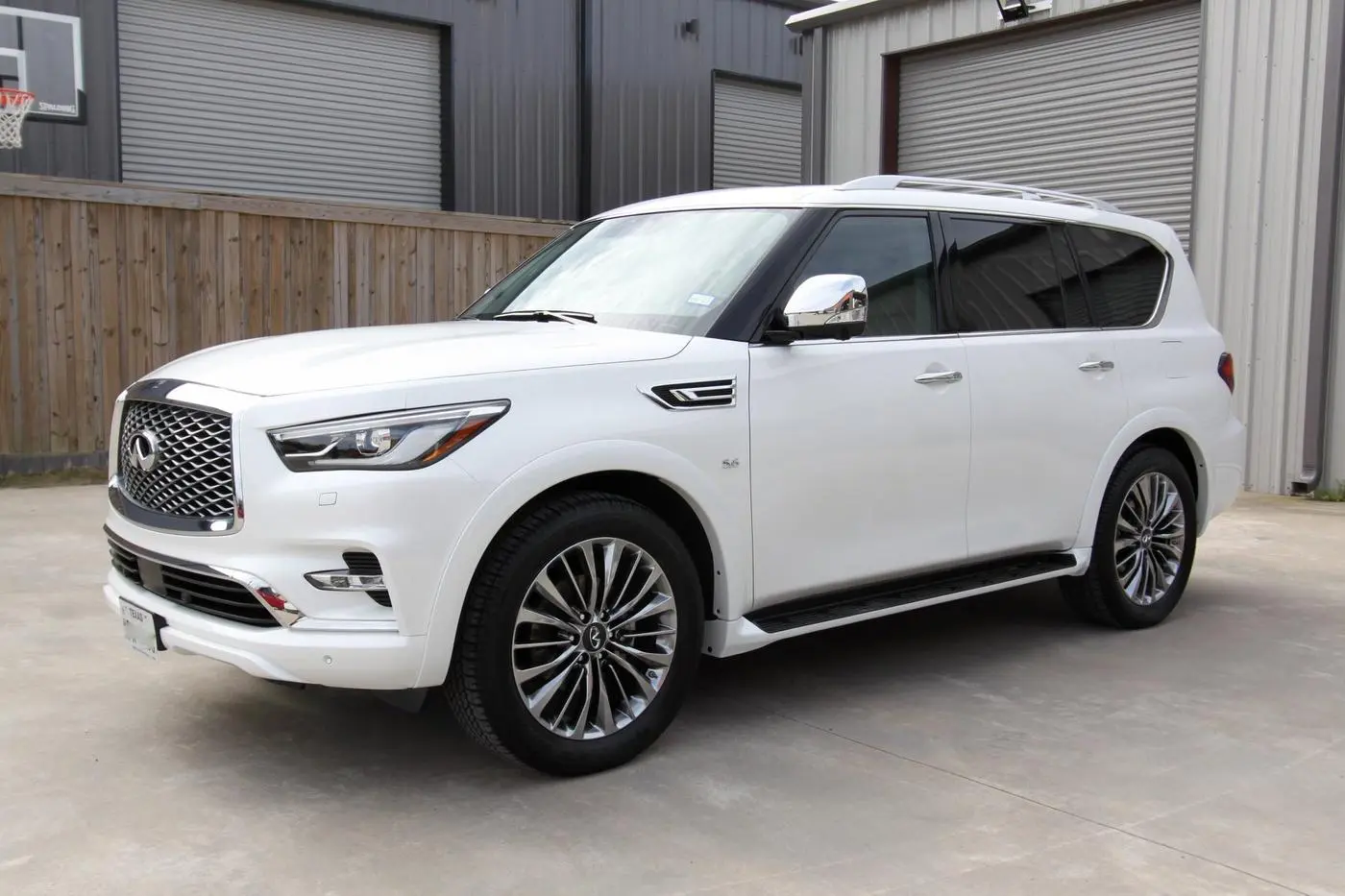 White Infiniti QX80 detailed by Derrick's Details in Austin, photo 2 of 18