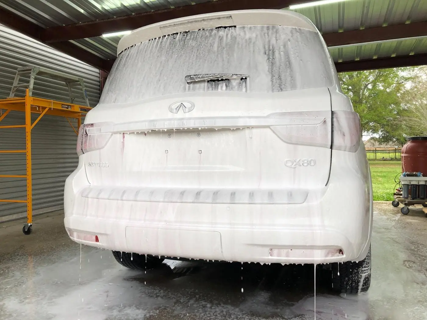 White Infiniti QX80 detailed by Derrick's Details in Austin, photo 15 of 18