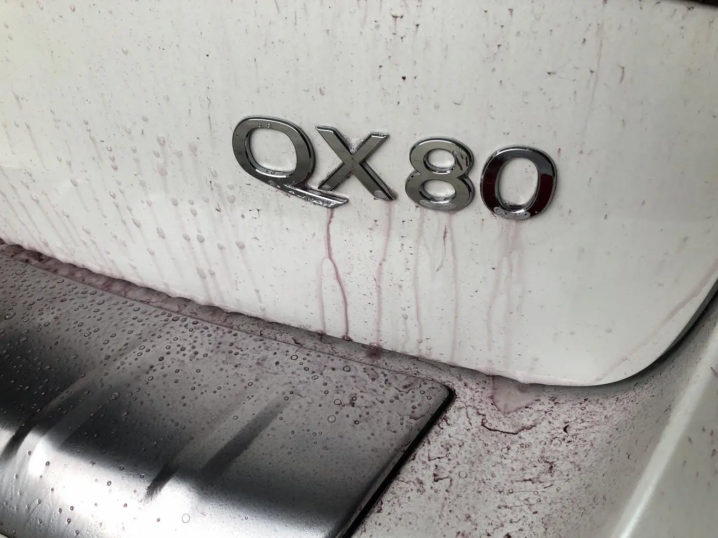White Infiniti QX80 detailed by Derrick's Details in Austin, photo 18 of 18