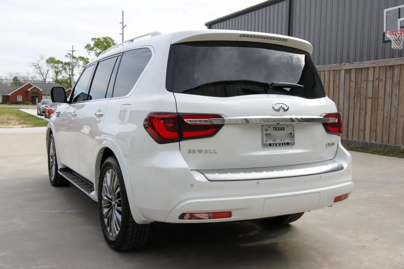 White Infiniti QX80 detailed by Derrick's Details in Austin, photo 3 of 18