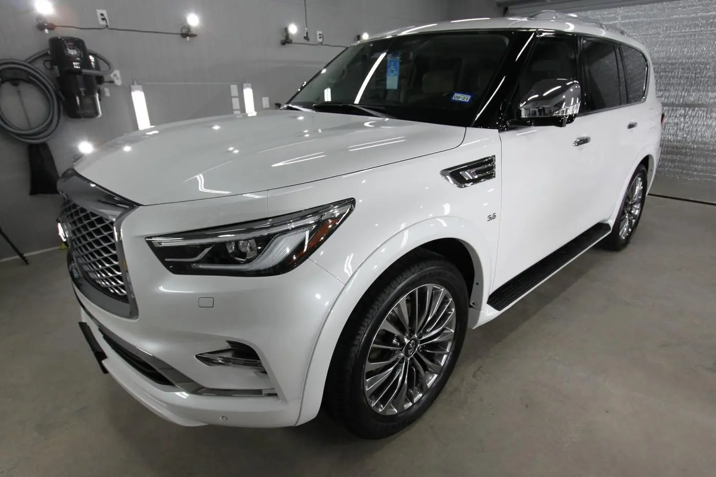 White Infiniti QX80 detailed by Derrick's Details in Austin, photo 4 of 18